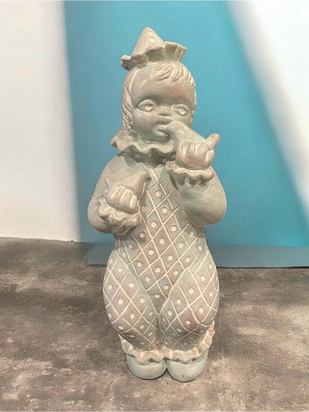 retired Isabel Bloom ceramic clown figurine with a diamond-patterned costume.